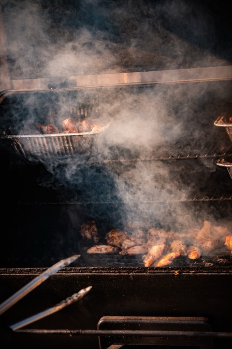 Chicken wings in the smoke